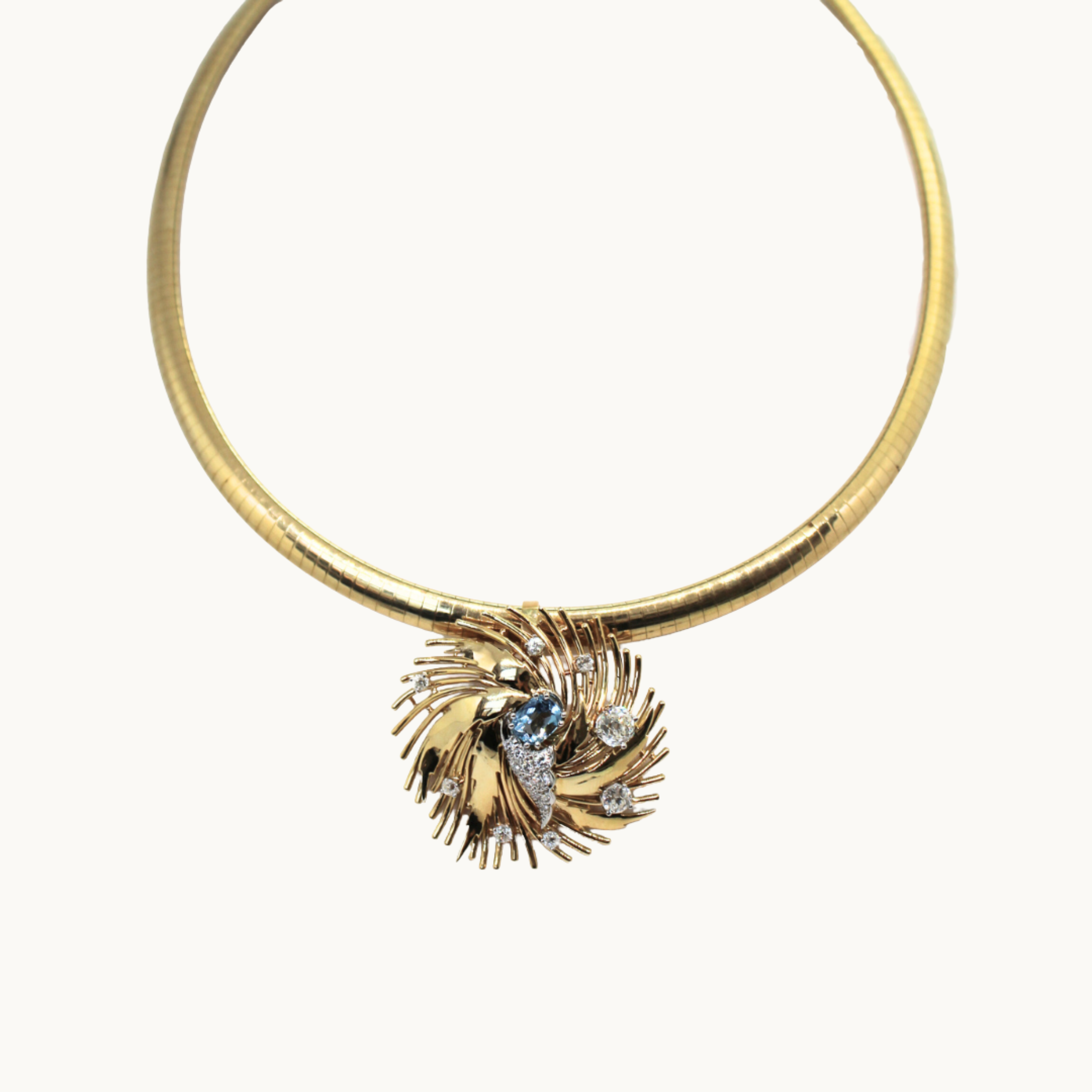 Rigid necklace in 14K yellow gold and pendant in 18K gold with aquamarine and diamonds