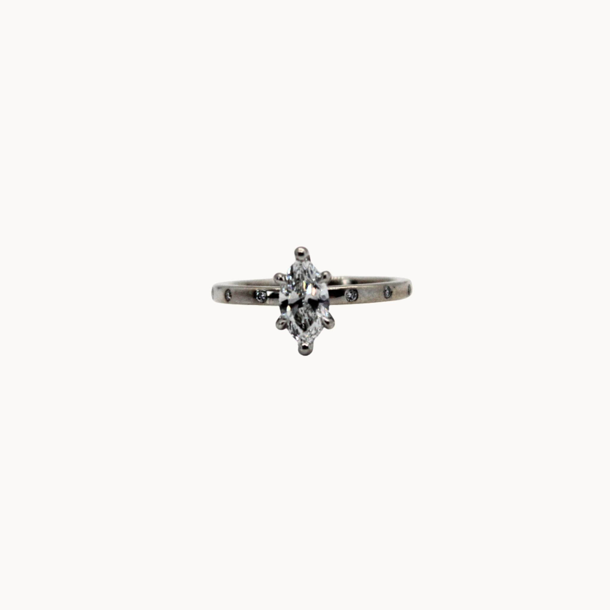 14K white gold solitaire with 0.70 carat marquise diamond