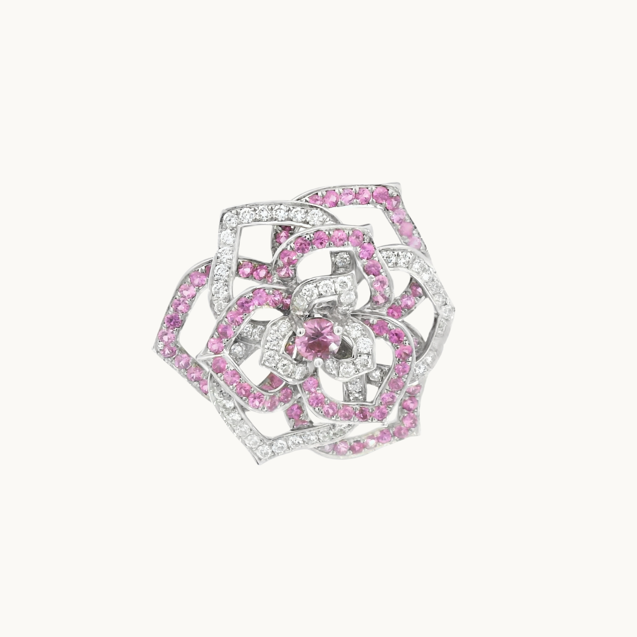 Rose-style pendant with 18K white gold, pink sapphires, and diamonds