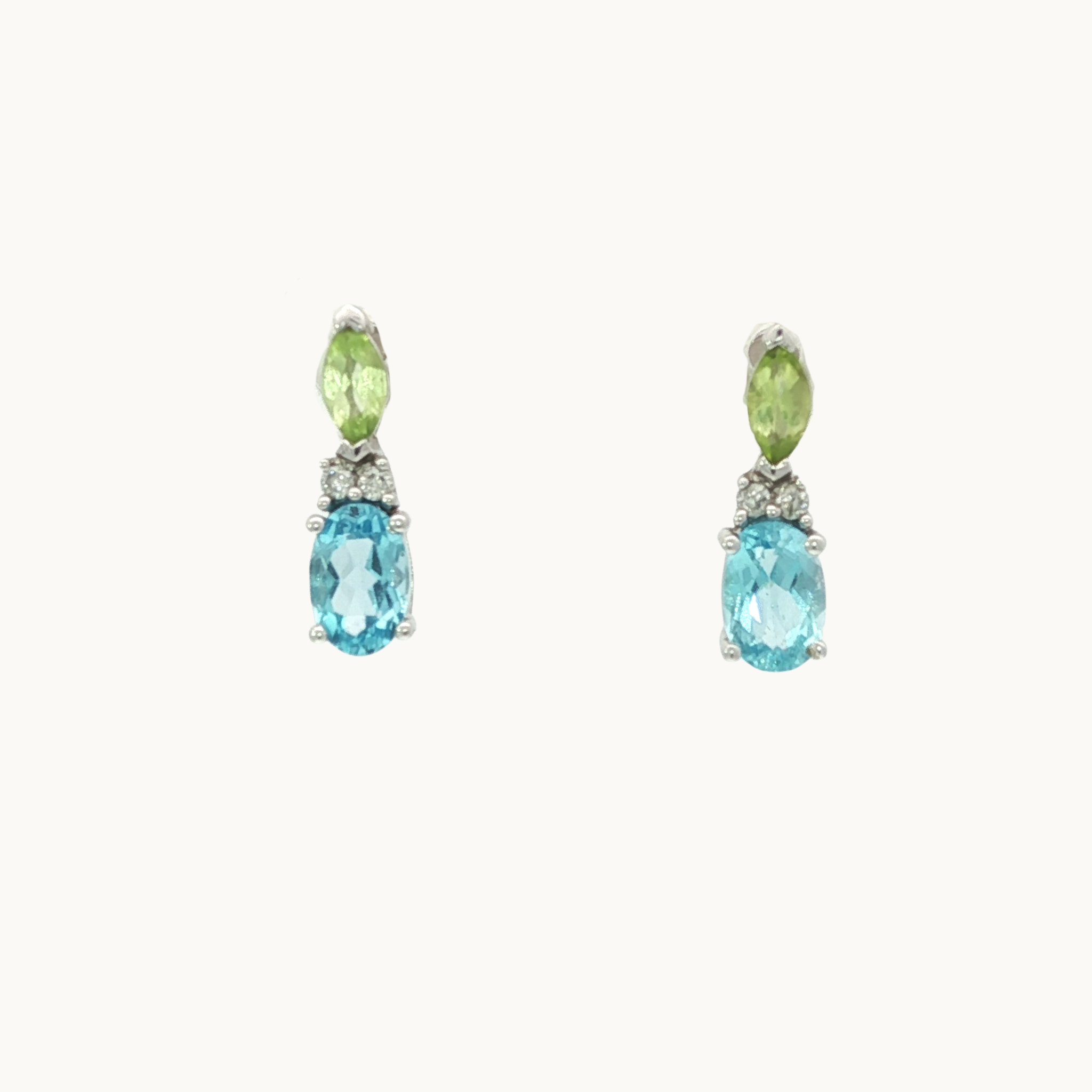 Boucles d'oreilles avec topazes, péridots et diamants