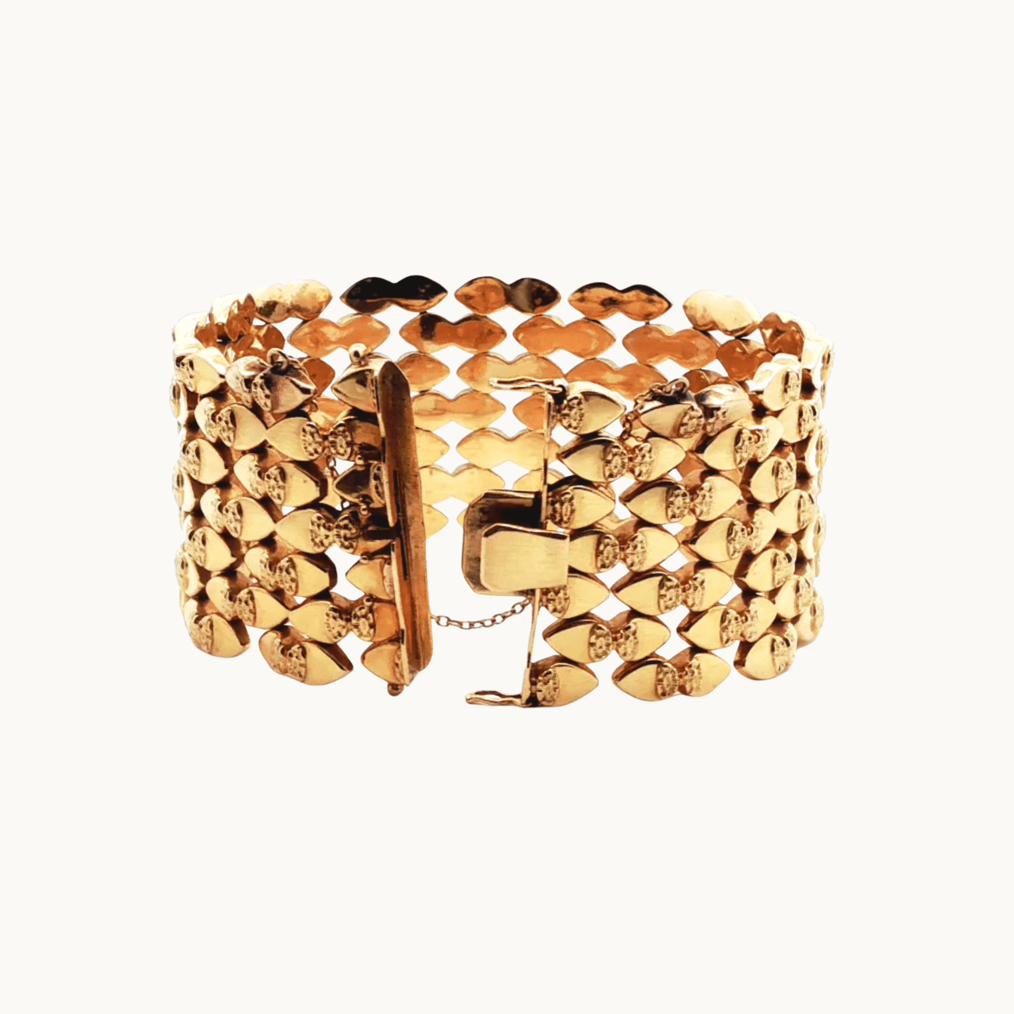 Semi-flexible cuff bracelet in 18K yellow gold