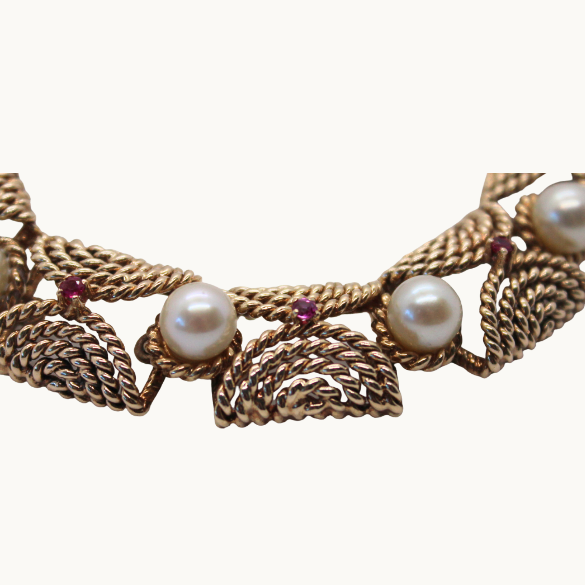 Articulated bracelet in 10K yellow gold with pearls and rubies