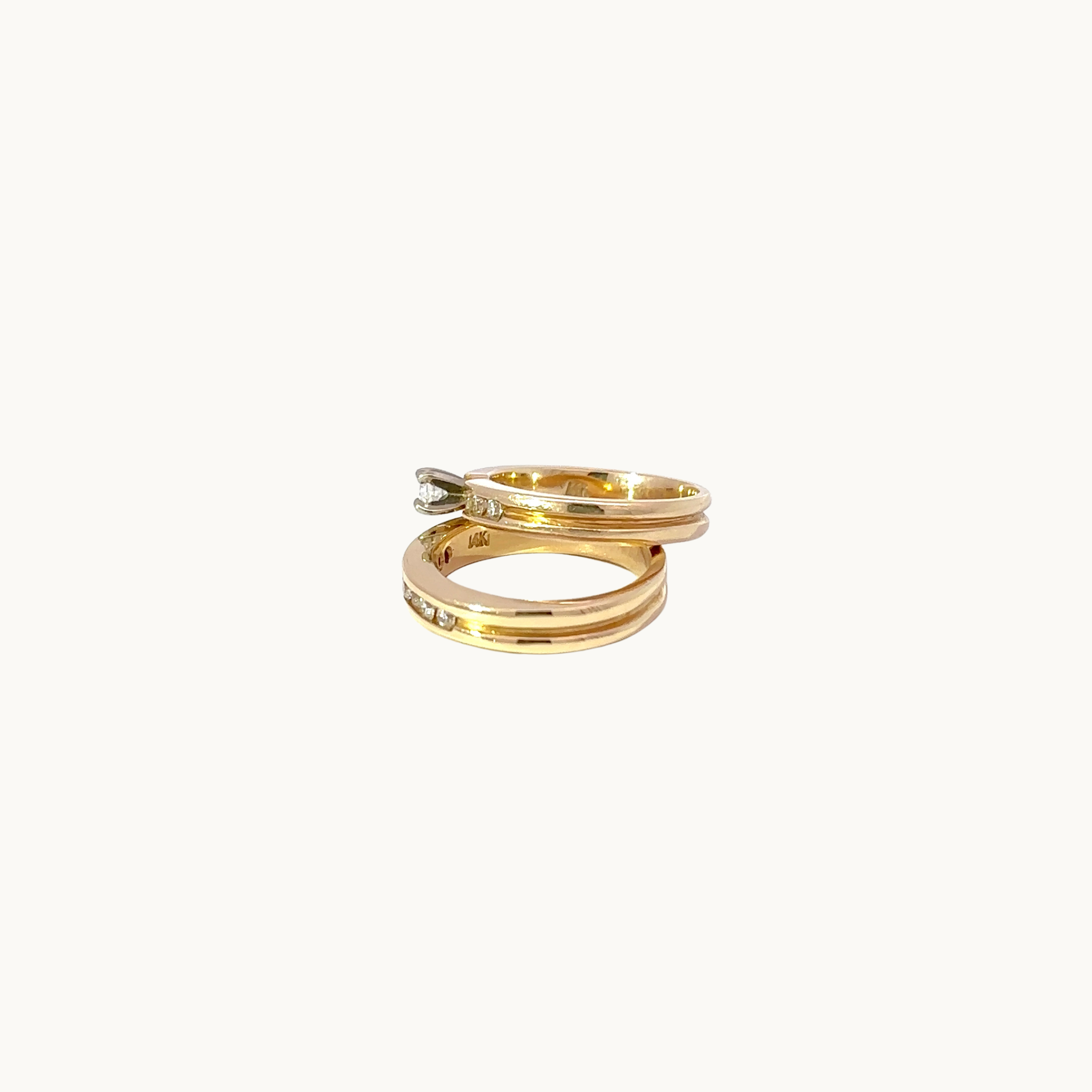 Solitaire and wedding band set in 14K yellow gold with diamonds