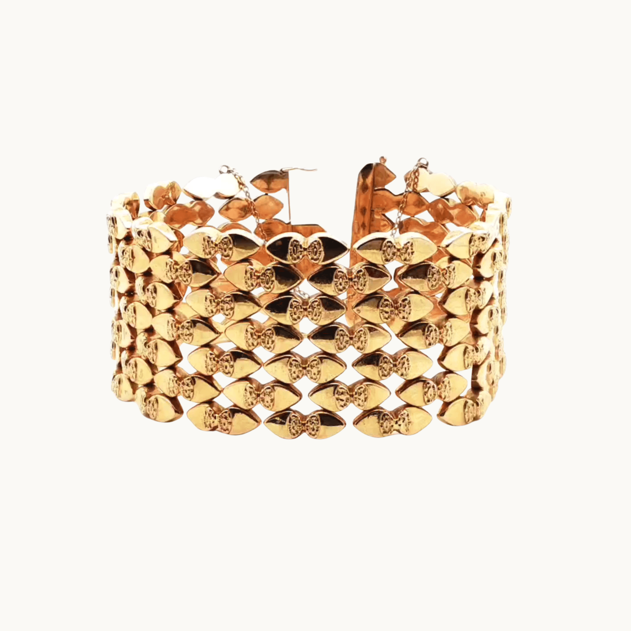 Semi-flexible cuff bracelet in 18K yellow gold