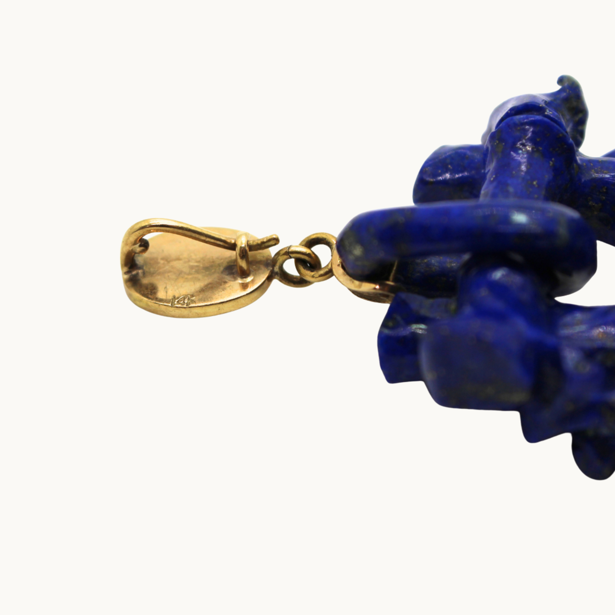 Lapis lazuli sculpture with 14K yellow gold