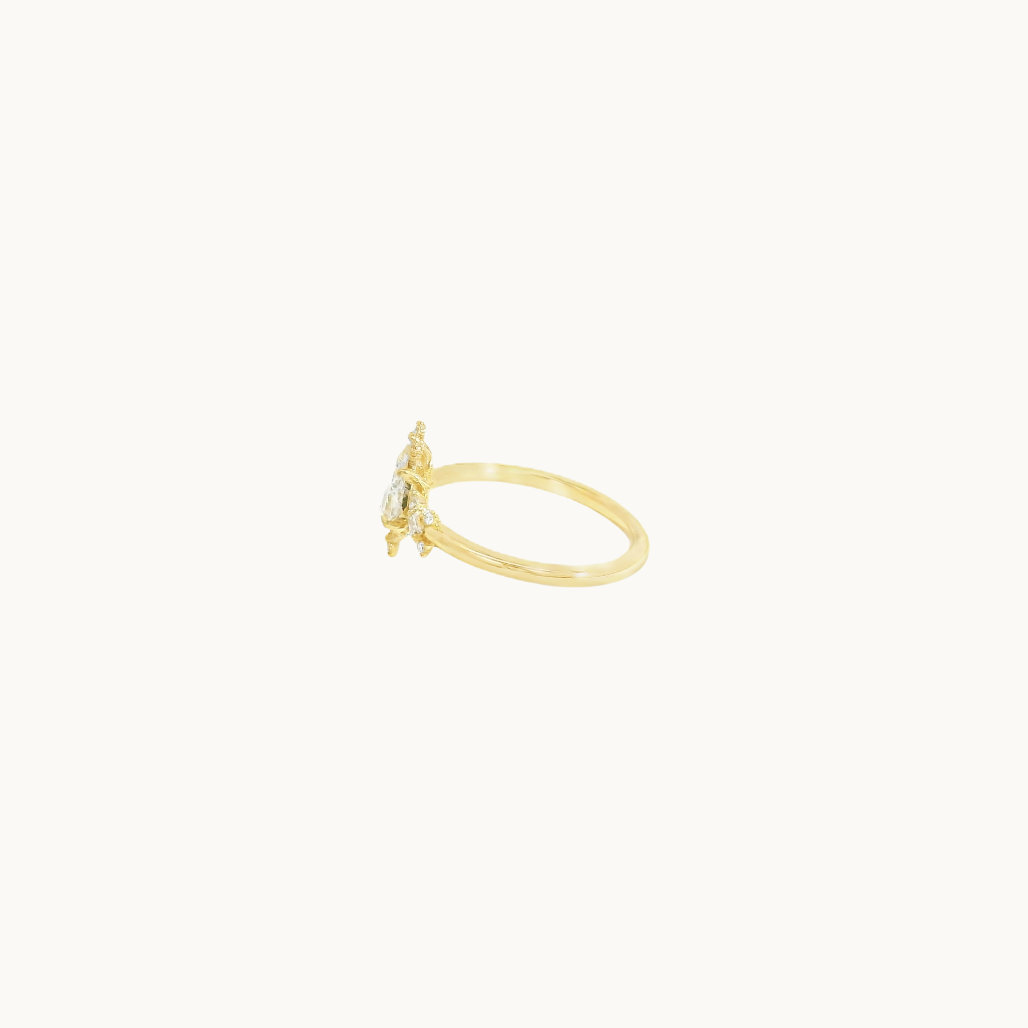 14K yellow gold star-shaped ring with diamonds