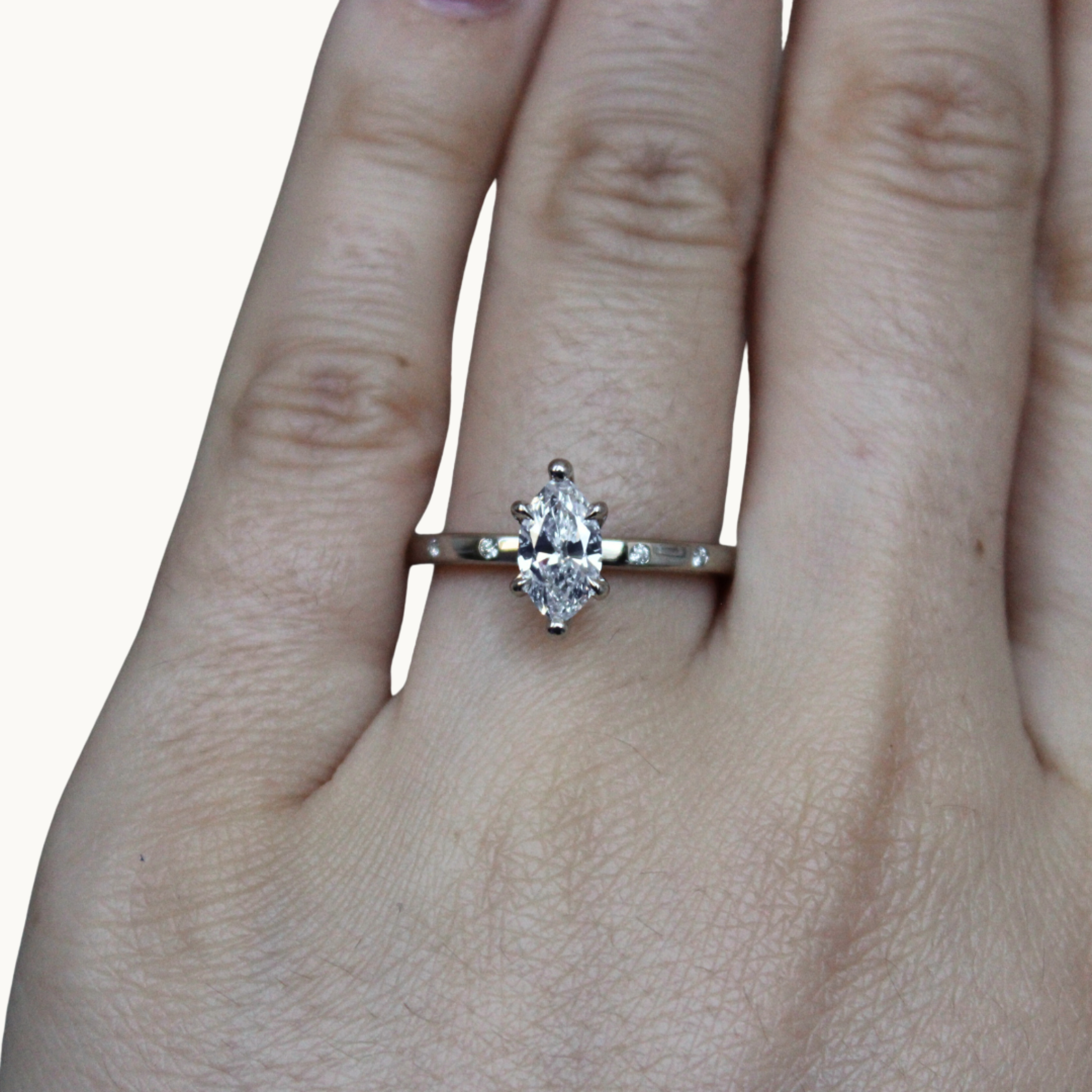 14K white gold solitaire with 0.70 carat marquise diamond