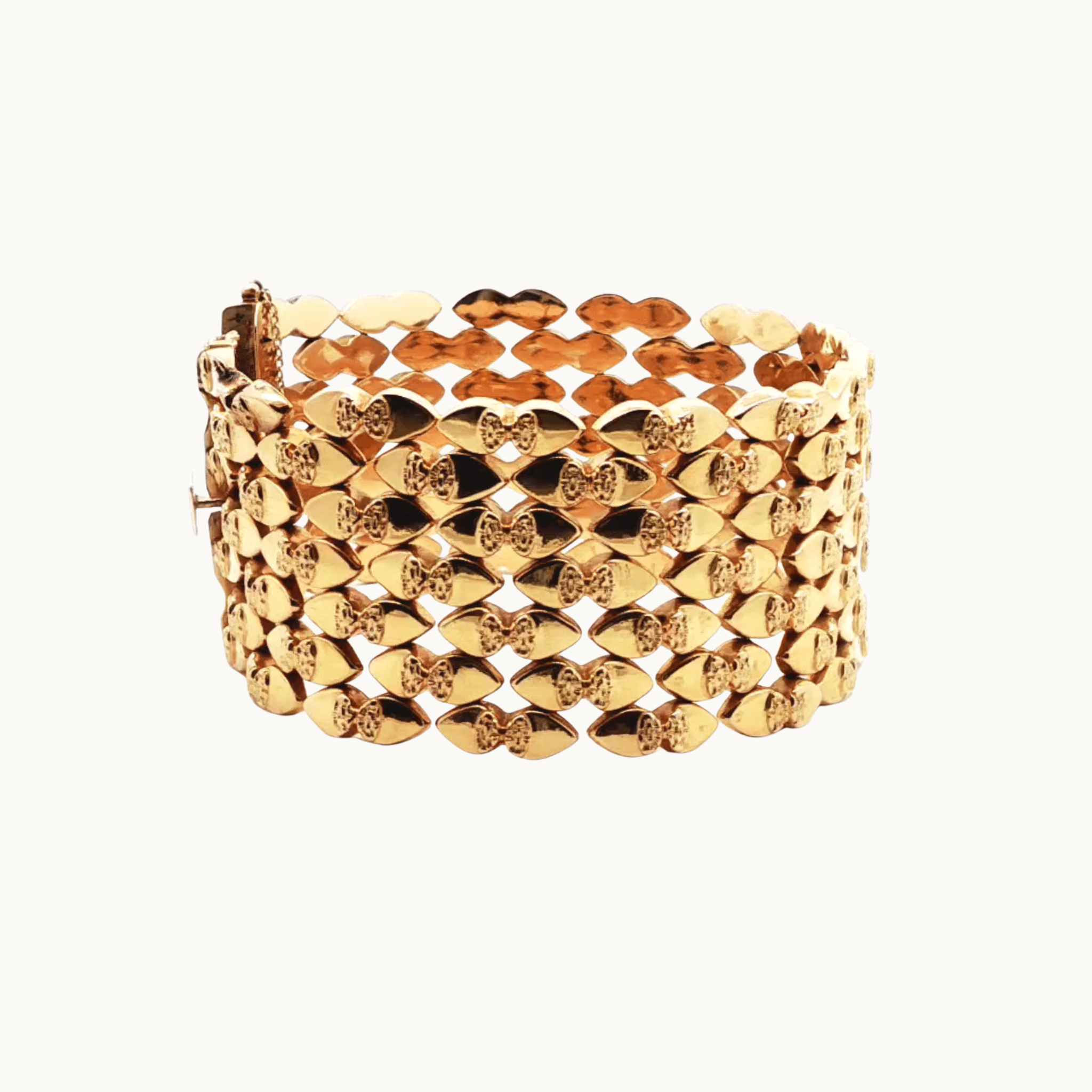 Semi-flexible cuff bracelet in 18K yellow gold
