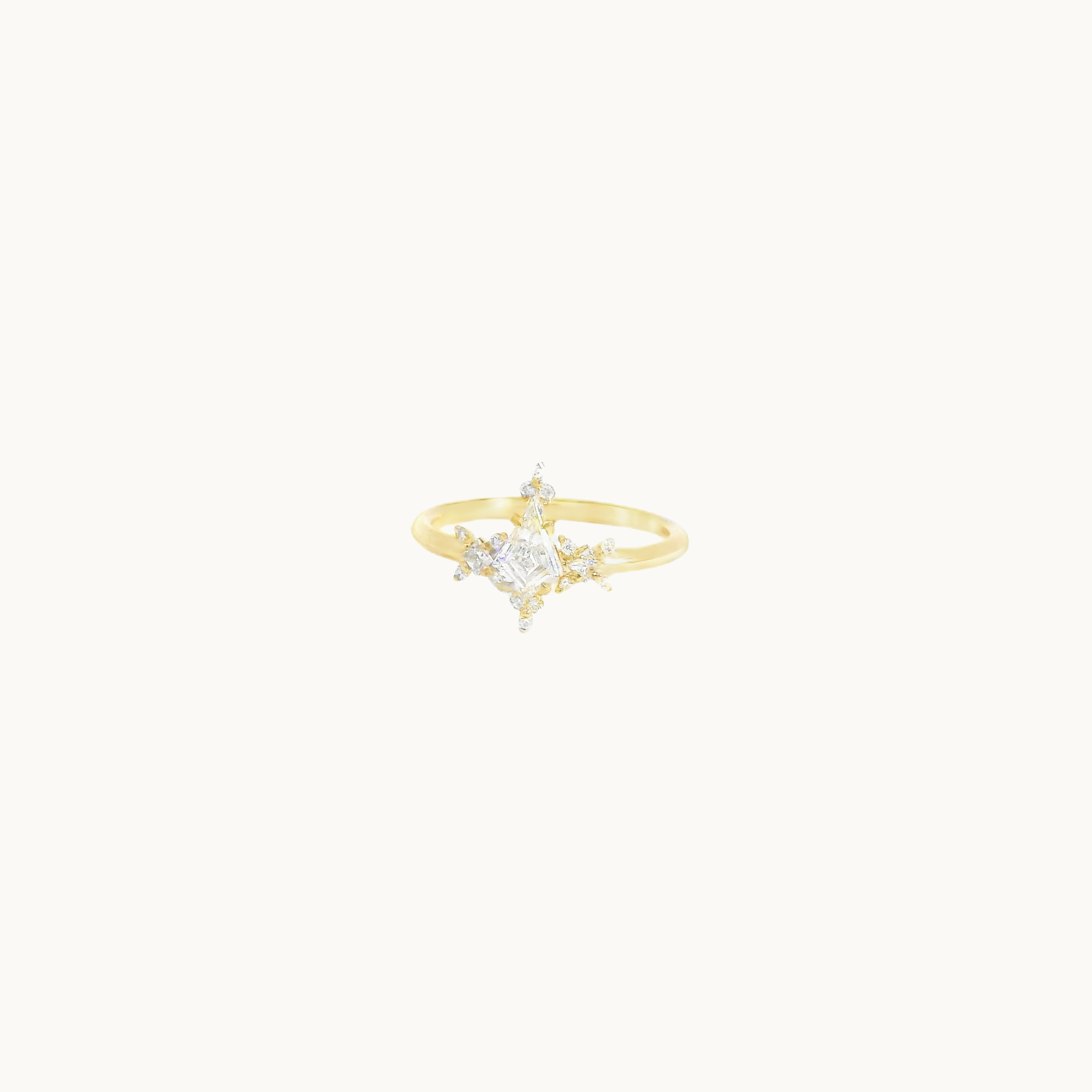 14K yellow gold star-shaped ring with diamonds