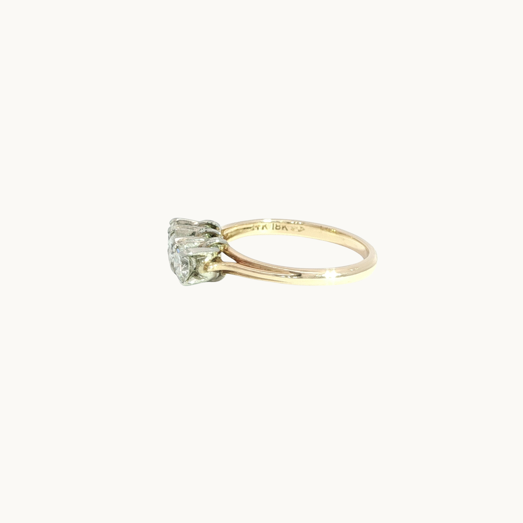 Trilogy ring in 14K white and yellow gold with diamonds