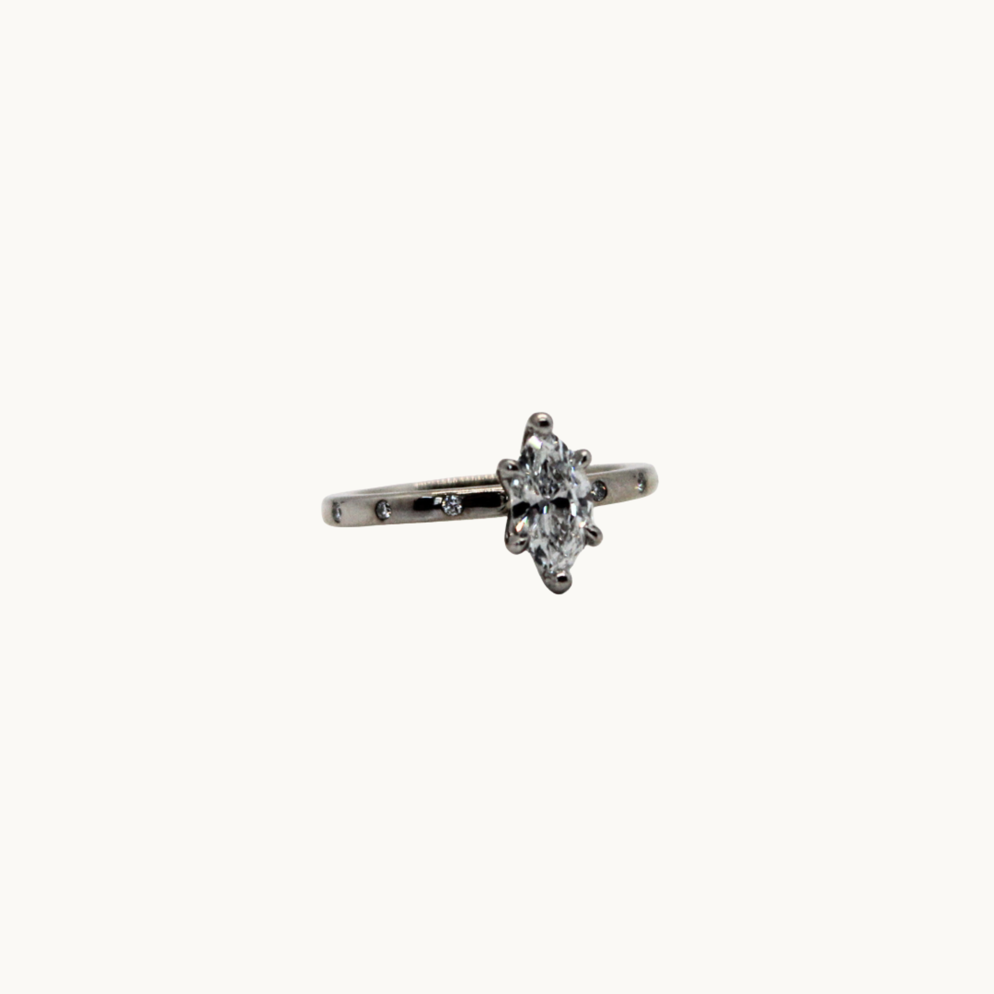 14K white gold solitaire with 0.70 carat marquise diamond