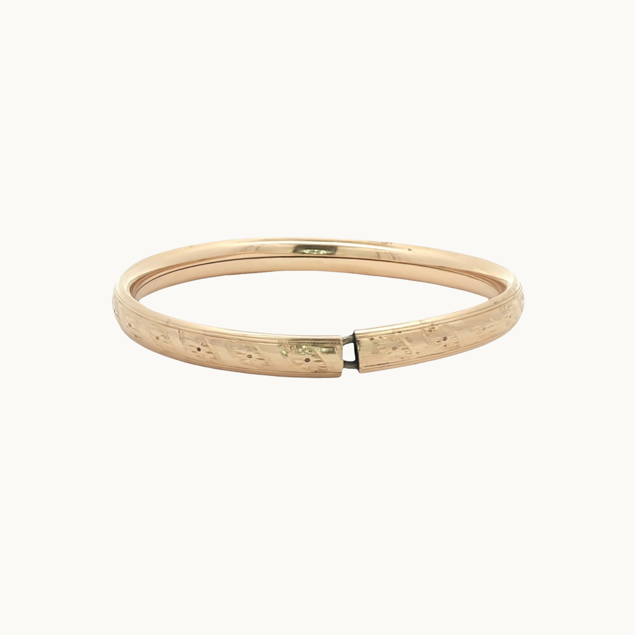 Children's bangle bracelet in 10K yellow gold