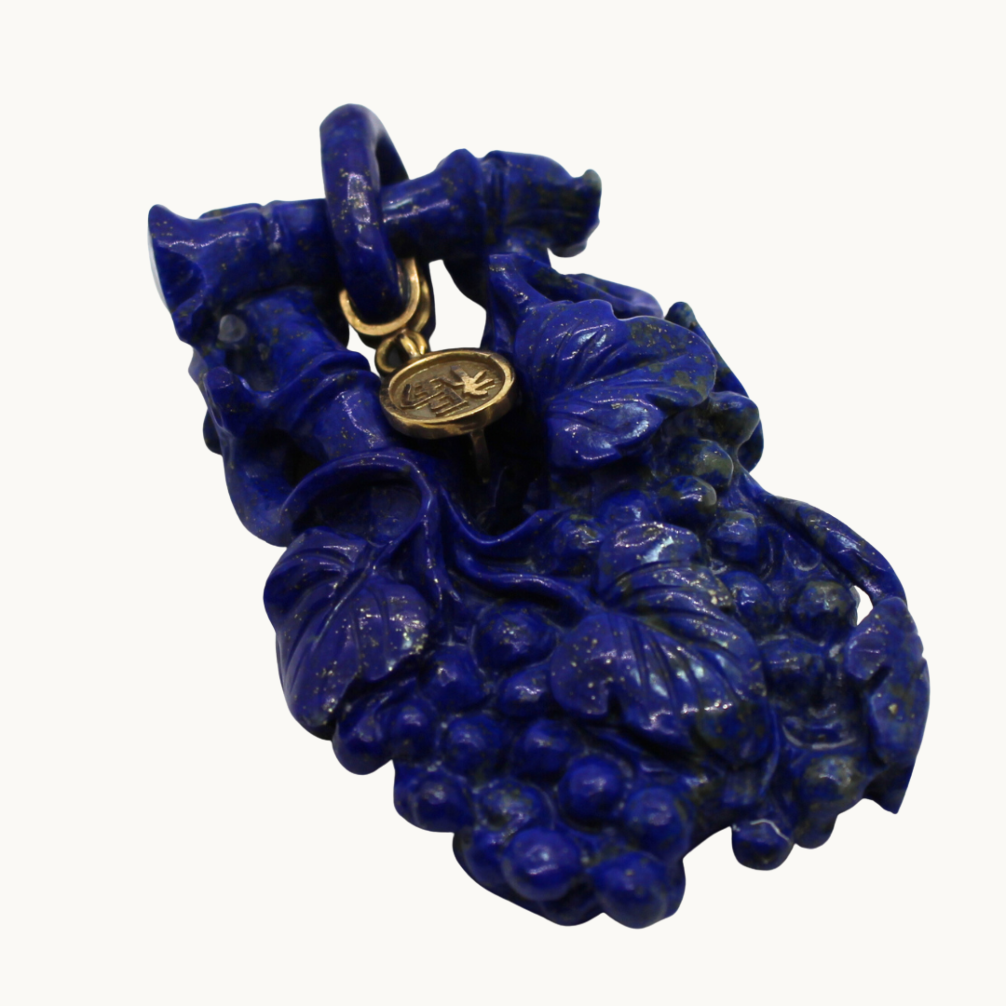 Lapis lazuli sculpture with 14K yellow gold