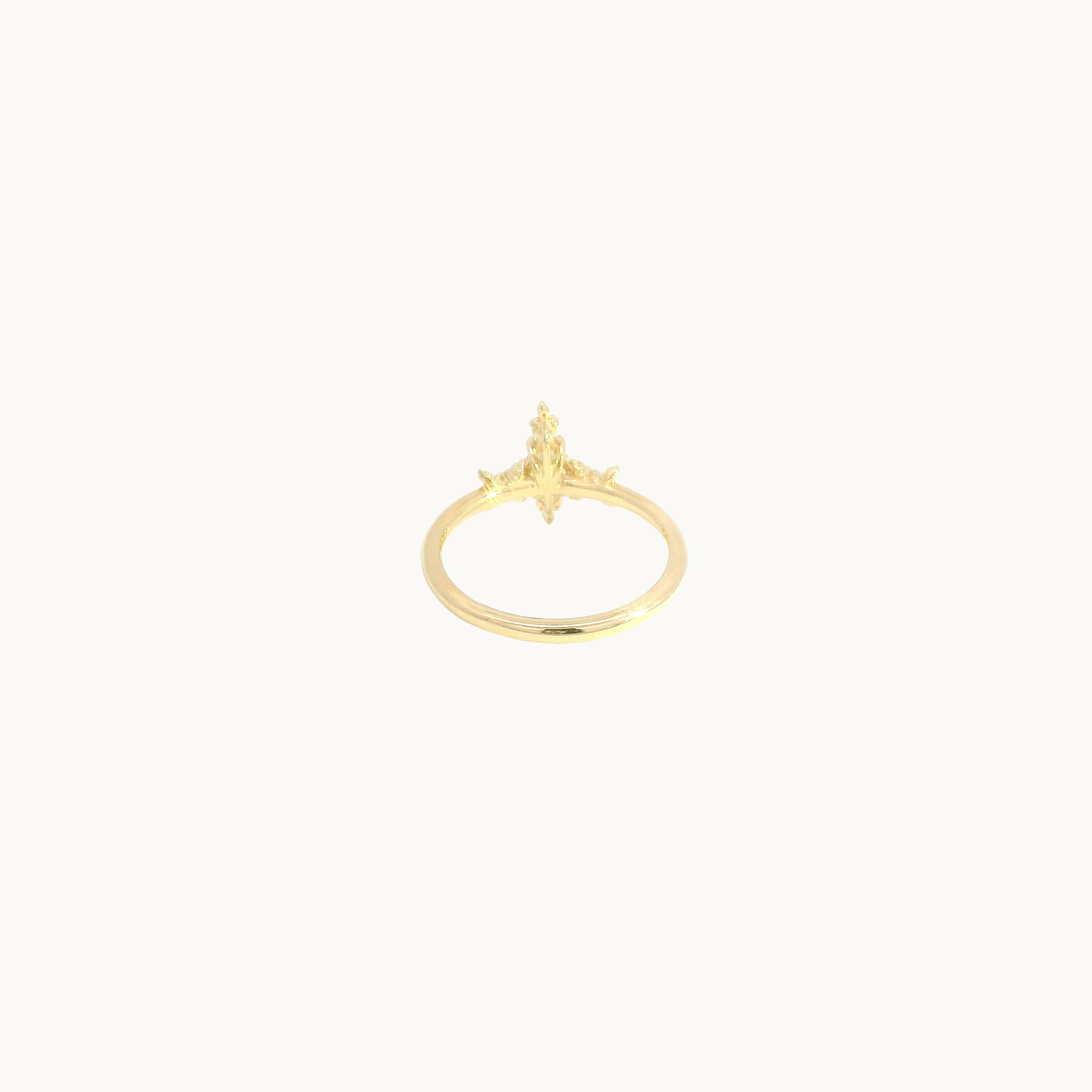 14K yellow gold star-shaped ring with diamonds