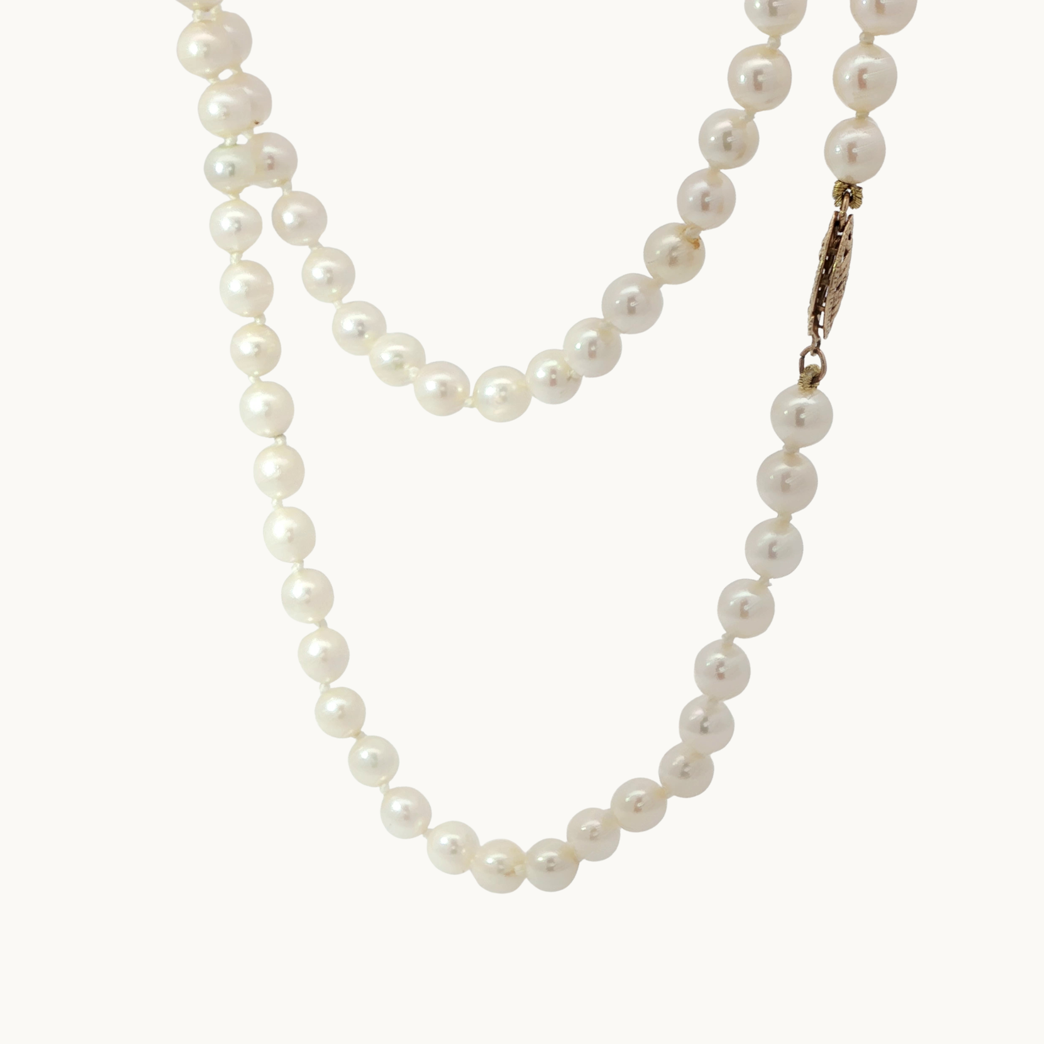 Akoya pearl long necklace with 14K yellow gold clasp